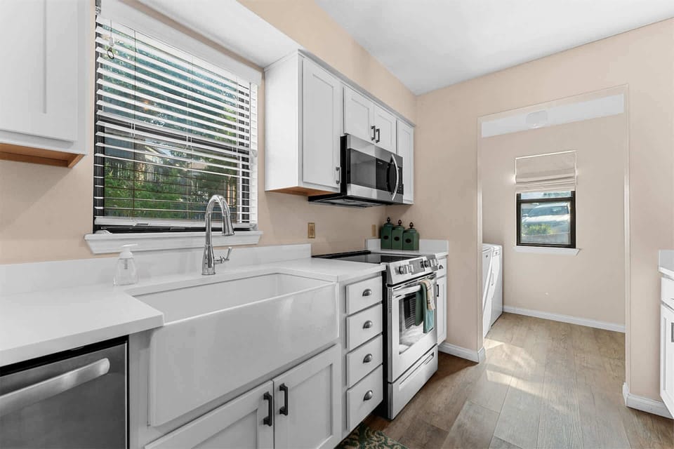 The airy kitchen offers ample space & all the comforts of home​