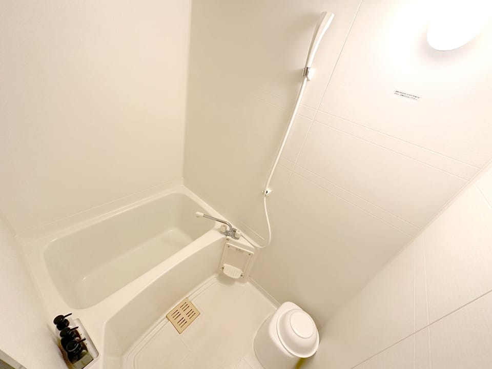 Japanese-style Room | Bathroom | Combined shower/tub, hair dryer, slippers, towels