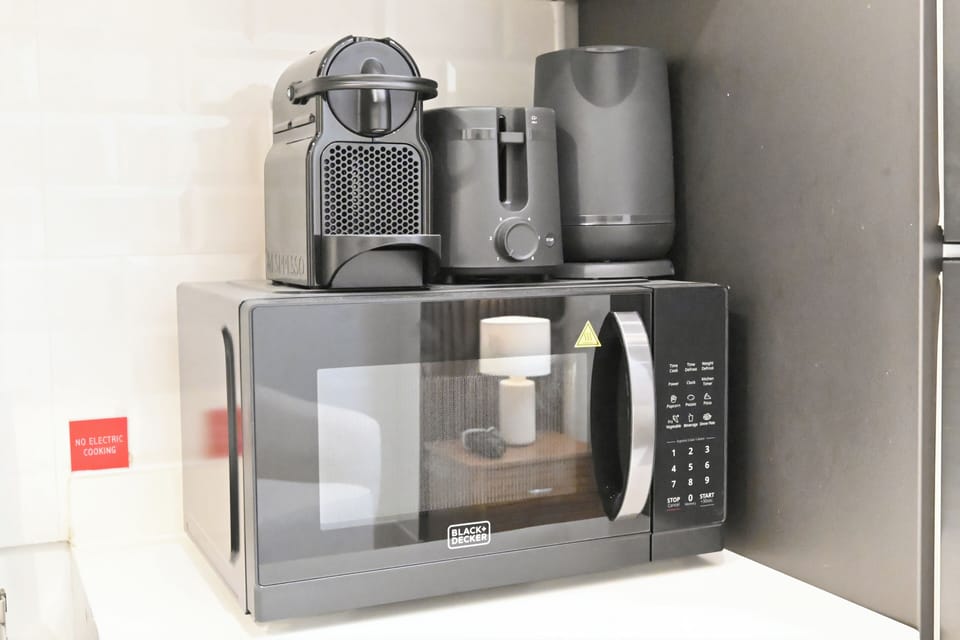 Apartment, Balcony, Courtyard View | Microwave