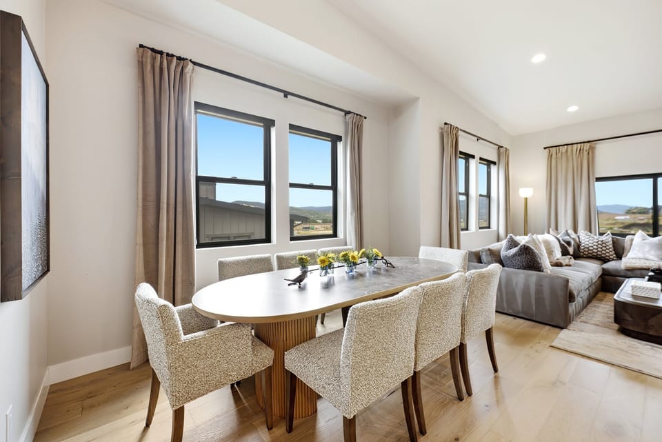 Open dining space at Keetley Vista overlooking the great room, creating an inviting setting for shared meals and mountain gatherings.