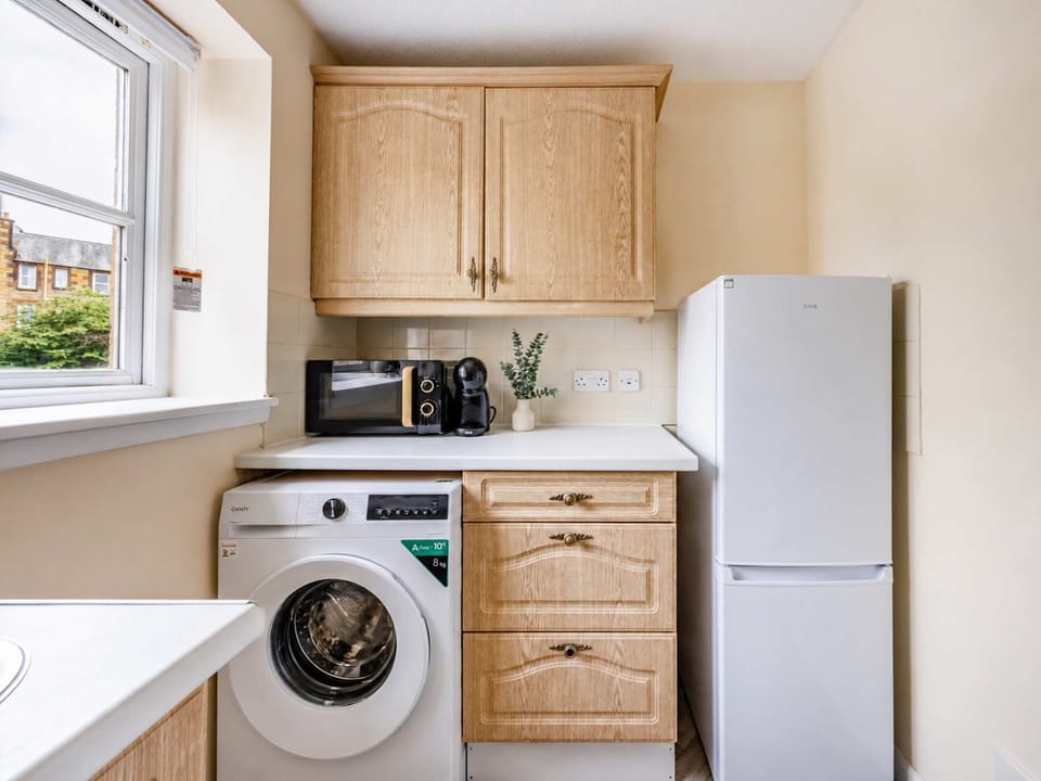 The kitchen is fully equipped to prepare a simple meal 
