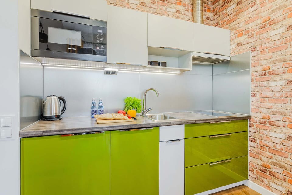 Apartment | Private kitchen | Cleaning supplies