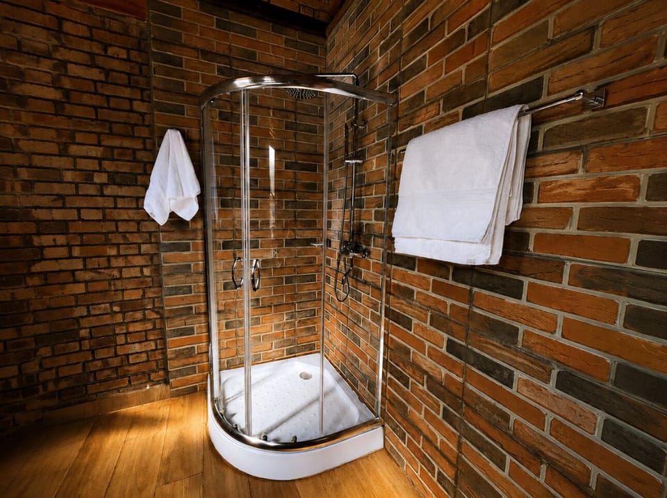 Standard Double Room, Lake View | Bathroom | Shower, slippers, towels, soap