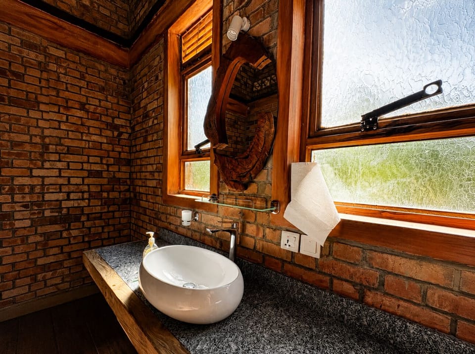 Standard Double Room, Lake View | Bathroom | Shower, slippers, towels, soap