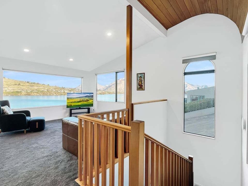 Open and airy split-level living designed to maximise the spectacular lake views.