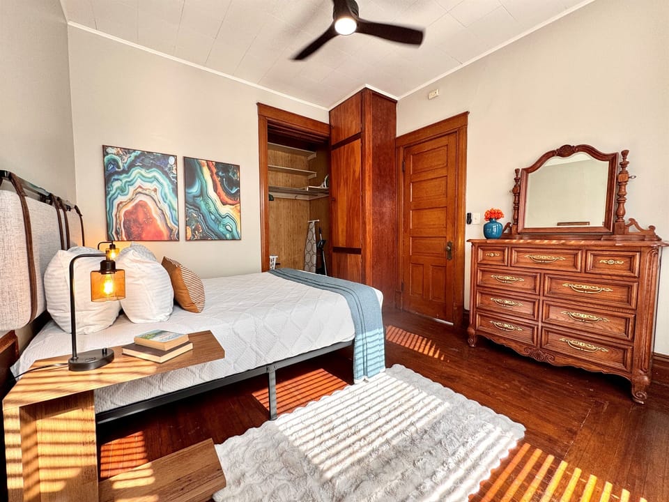 Lots of storage including a large walk in closet, huge storage cabinet and a gorgeous solid wood dresser with mirror.