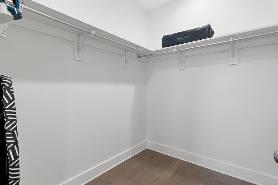 Master closet,pack n play, ironing board and iron