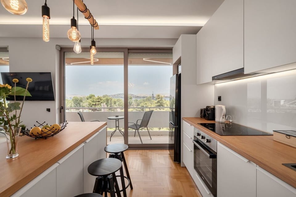 Kitchen and dining area opening onto the balcony