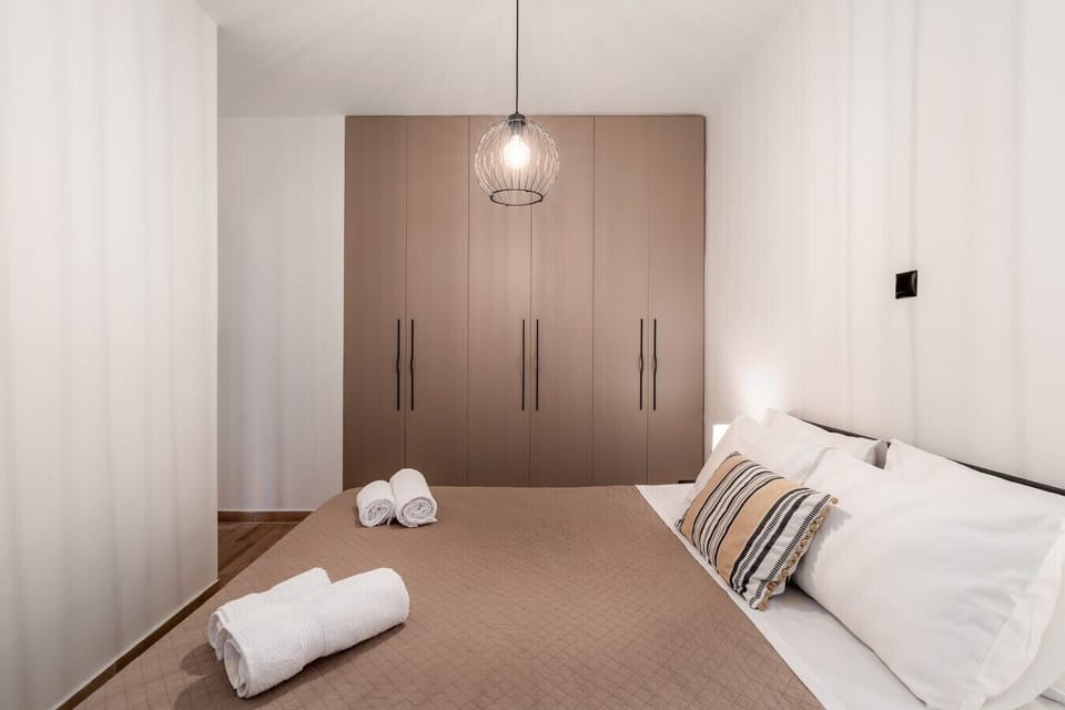 Bedroom with full-height wardrobe storage
