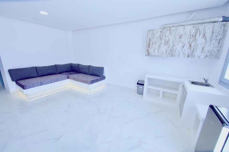 Family Suite with Sofa | Frette Italian sheets, premium bedding, memory foam beds, in-room safe