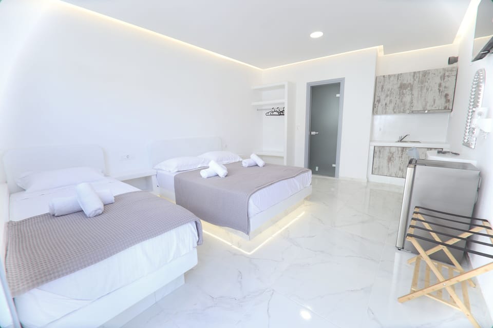 Deluxe Triple Room | Frette Italian sheets, premium bedding, memory foam beds, in-room safe