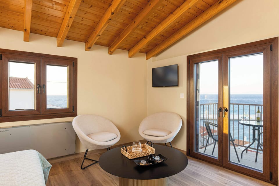 Bright open-plan suite with sea-view balcony