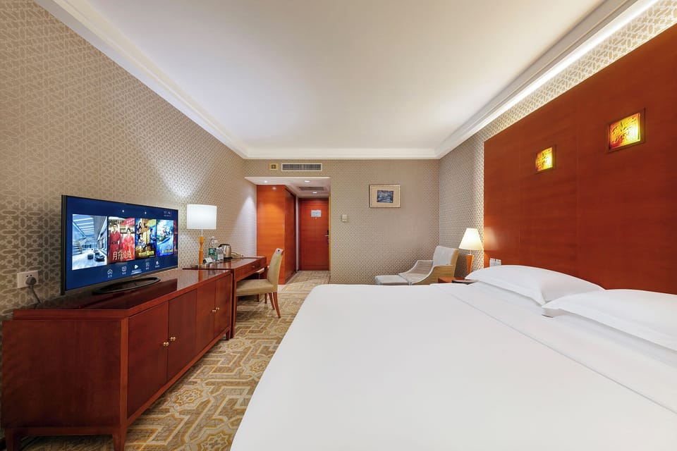 Business Double Room, Garden View | In-room safe, desk, laptop workspace, blackout drapes