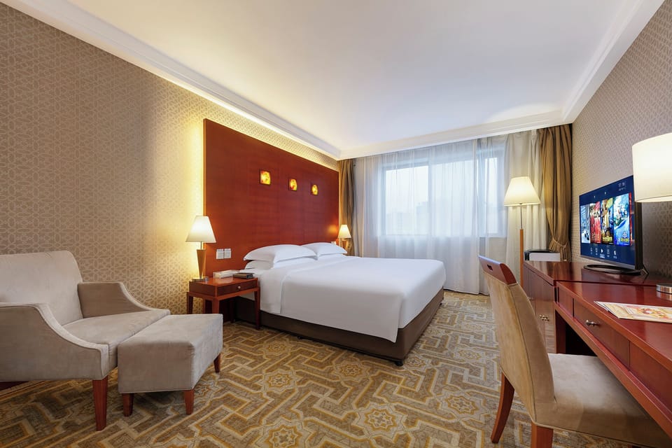 Business Double Room, Garden View | In-room safe, desk, laptop workspace, blackout drapes