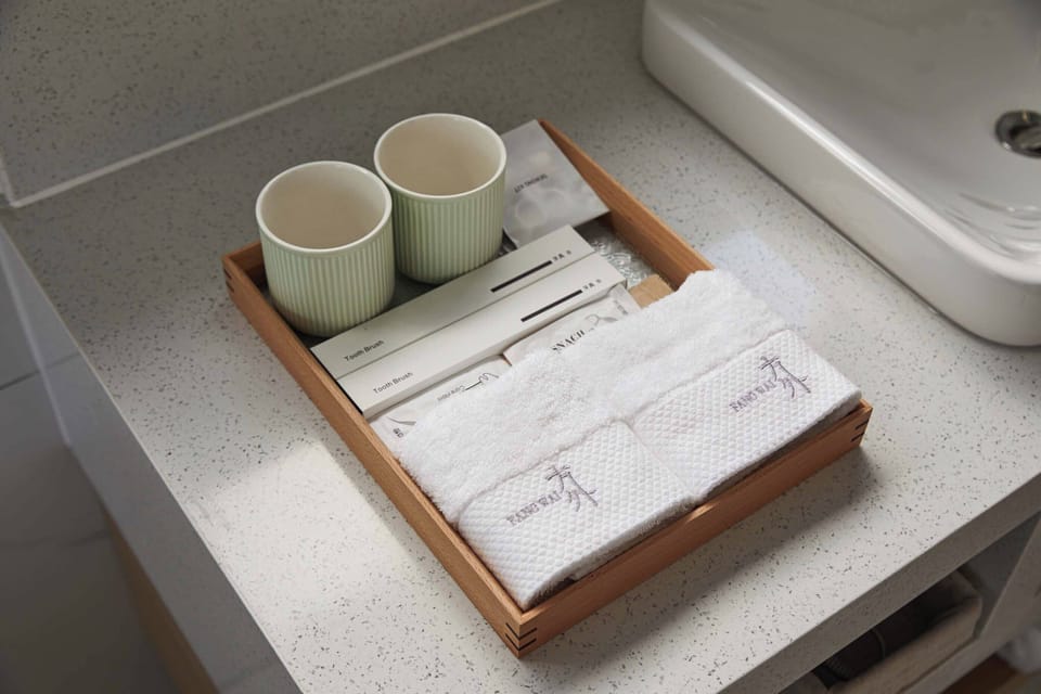Comfort Twin Room, Garden View, Poolside | Bathroom amenities | Hair dryer, towels, soap, shampoo
