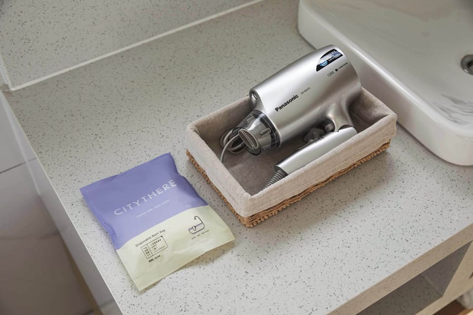 Deluxe Twin Room, Garden View, Poolside | Bathroom amenities | Hair dryer, towels, soap, shampoo