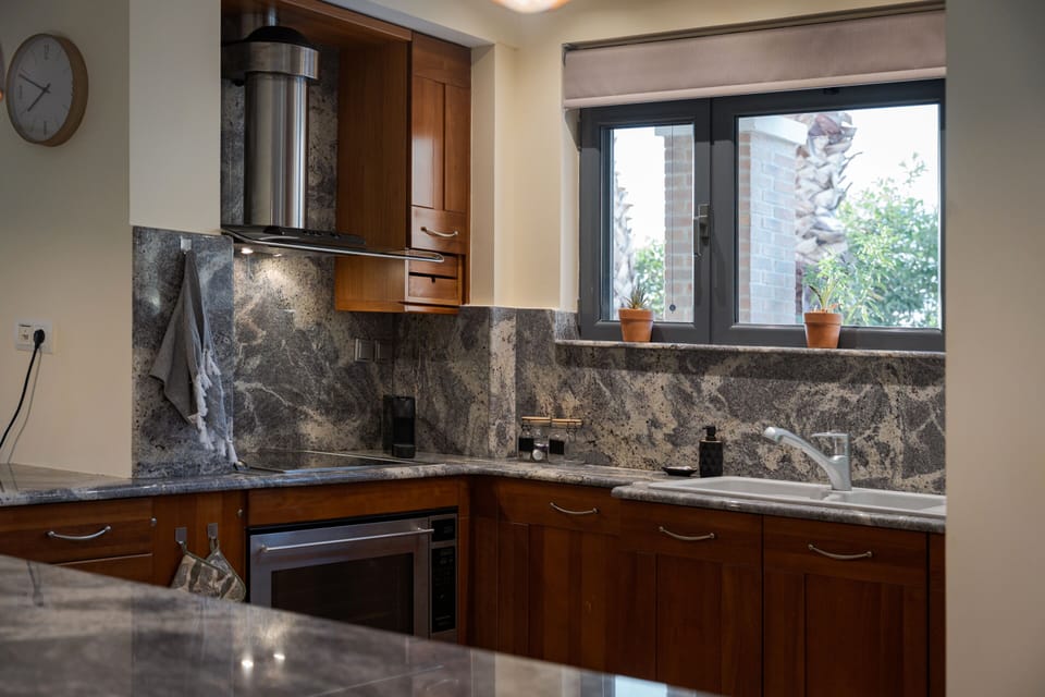 Superior Villa, Sea View | Private kitchen | Espresso maker, coffee/tea maker, full-size fridge, microwave