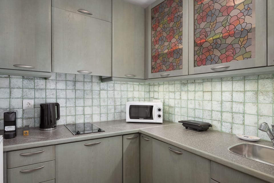 Superior Villa, Sea View | Private kitchen | Espresso maker, coffee/tea maker, full-size fridge, microwave