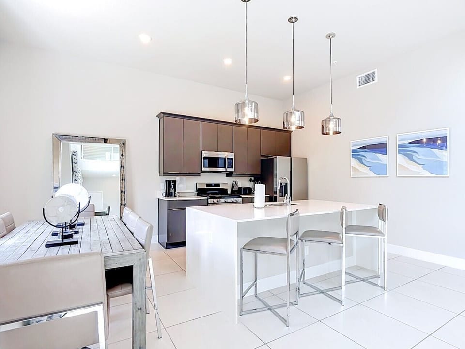 Modern kitchen with island and stainless steel appliances