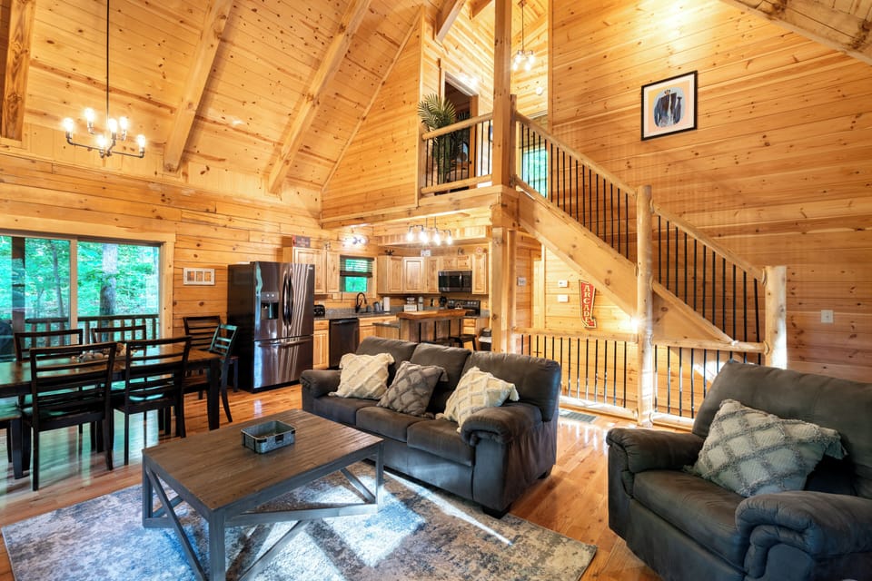 Main level living space with full kitchen and dining areas 