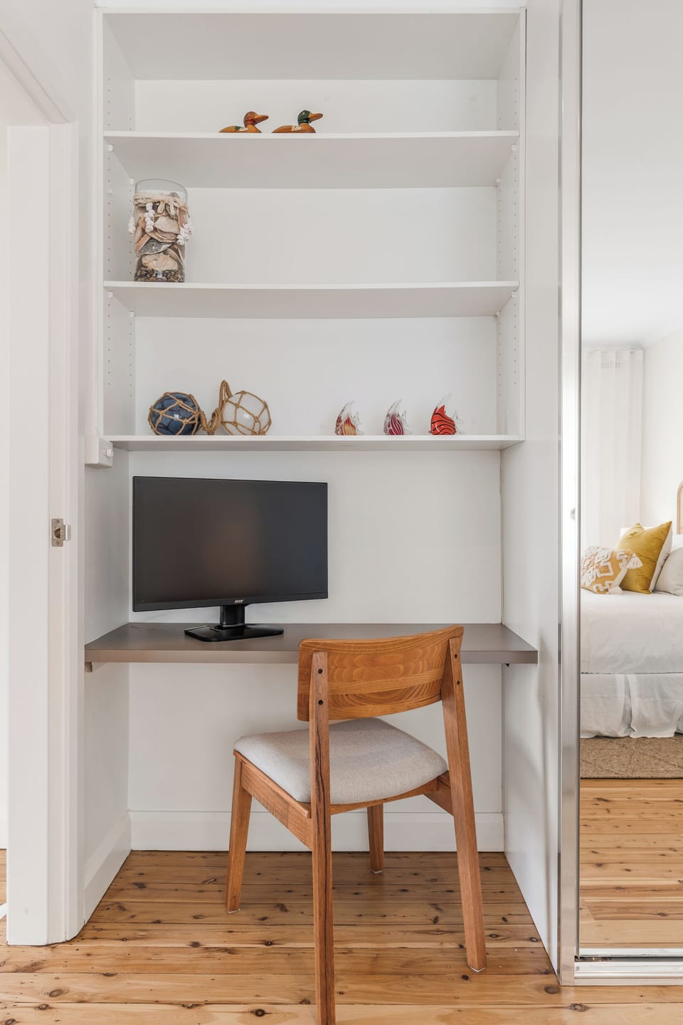 Catch up on work at the dedicated workspace, thoughtfully positioned with built-in shelving and everything you need to stay productive.