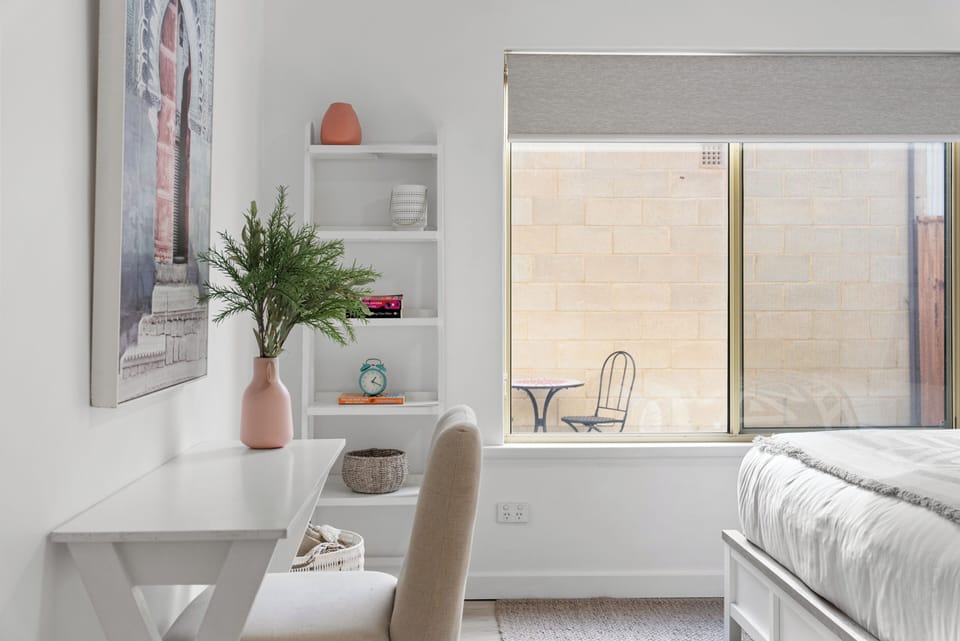 Settle into the dedicated workspace in the primary bedroom, where natural light and a quiet setting make it easy to catch up on work or plan tomorrow's coastal adventures.