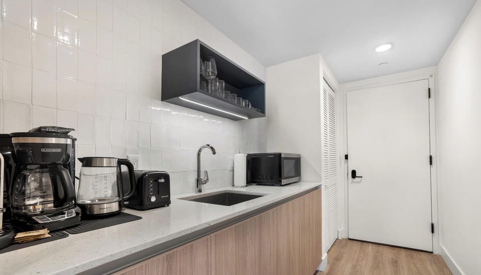 Condo, City View | Private kitchen | Espresso maker, microwave, paper towels