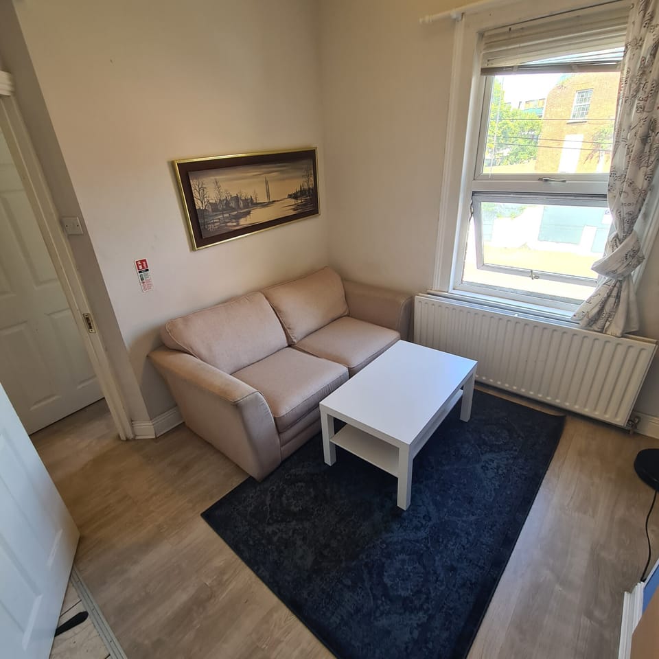 Bright, cozy lounge nook with natural light and comfortable seating