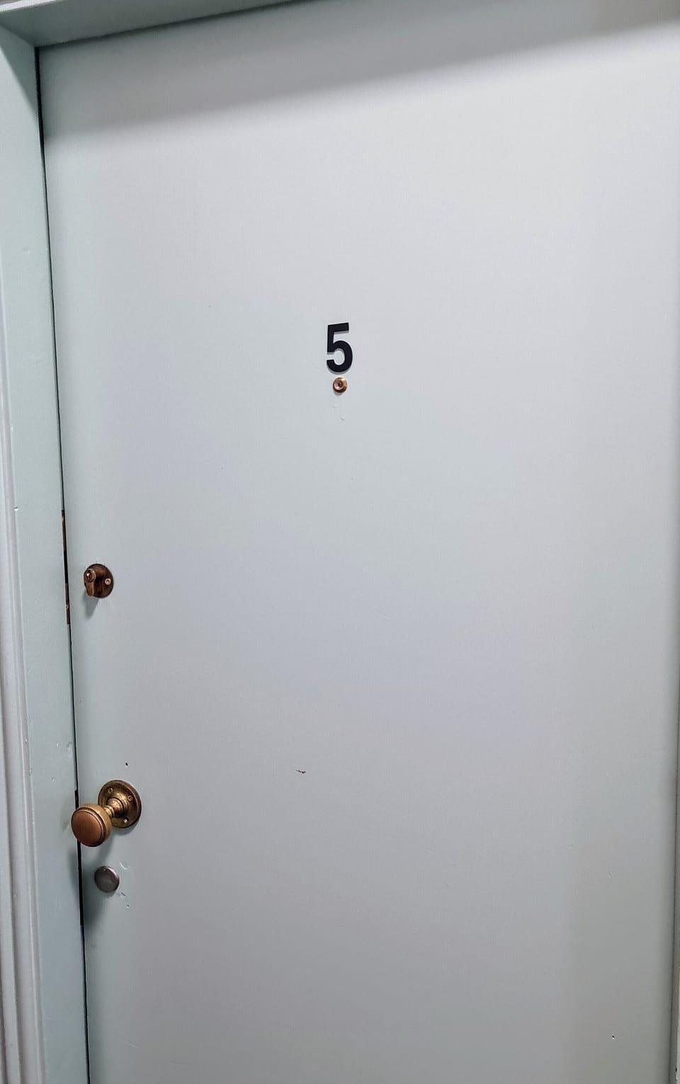 Private entry door with secure access and easy unit identification