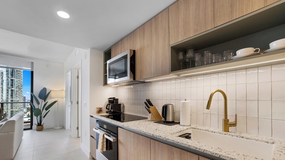 Condo, Balcony, City View | Private kitchen | Espresso maker, fridge, dishwasher, cookware/dishes/utensils