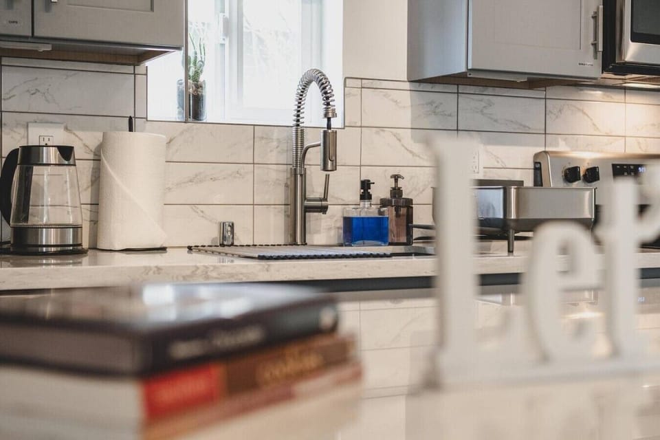Fully equipped kitchen with modern fixtures and plenty of counter space—especially convenient for extended stays.