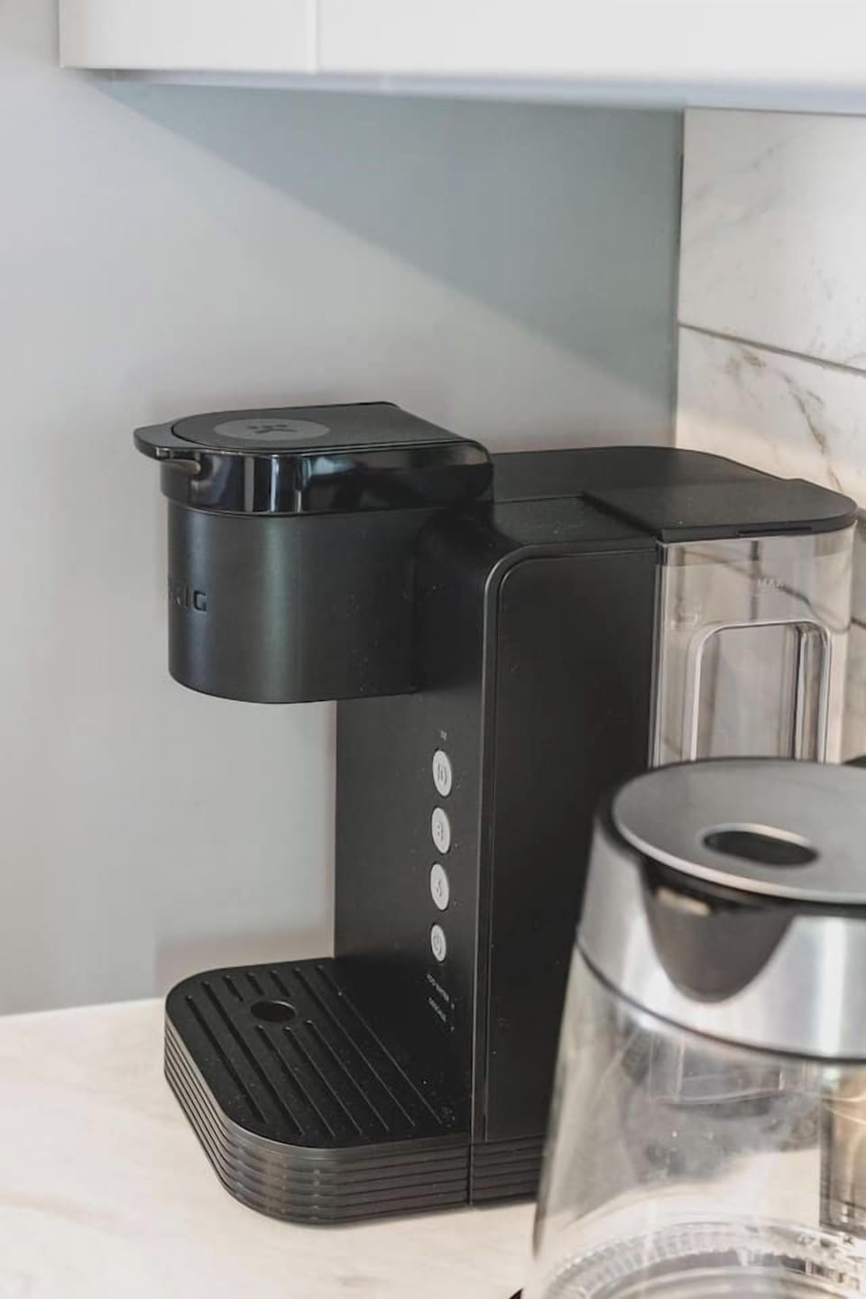 Start your morning at home with a convenient in-kitchen coffee maker—perfect before heading out for the day.