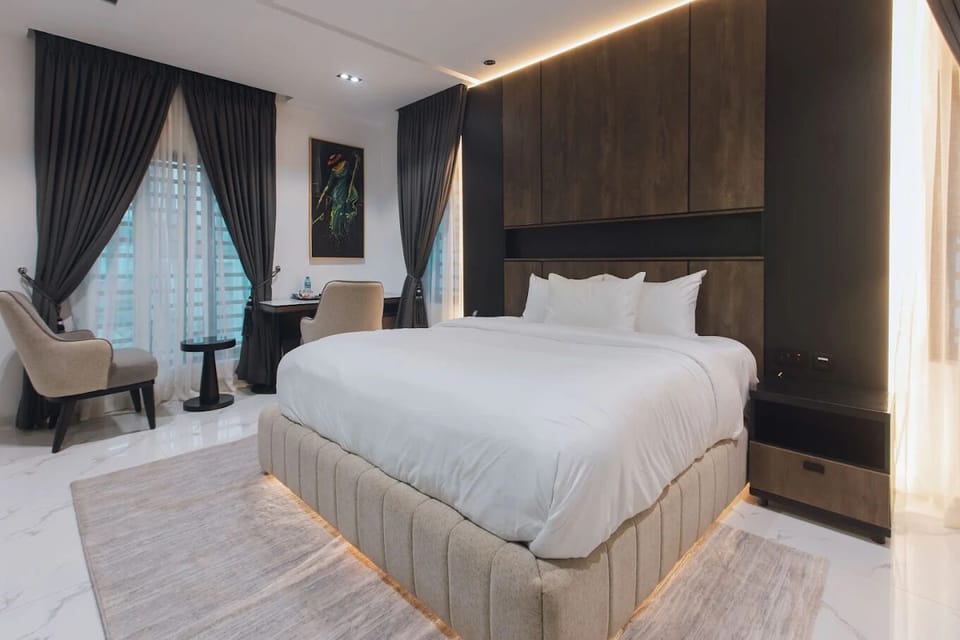 Standard Apartment, Balcony, City View | In-room safe, desk, laptop workspace, blackout drapes