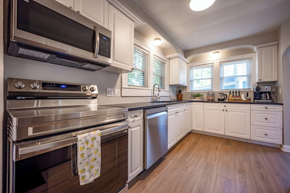 Bright modern kitchen with stainless appliances and plenty of prep space