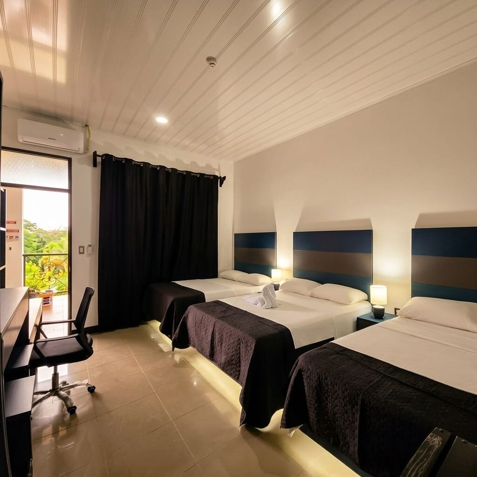 Family Suite | Blackout drapes, WiFi (free), bed sheets