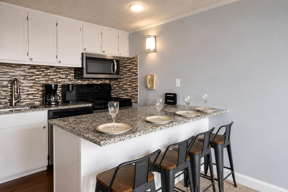 Whether you're grabbing a quick bite or preparing a gourmet dinner, the fully equipped kitchen has you covered.