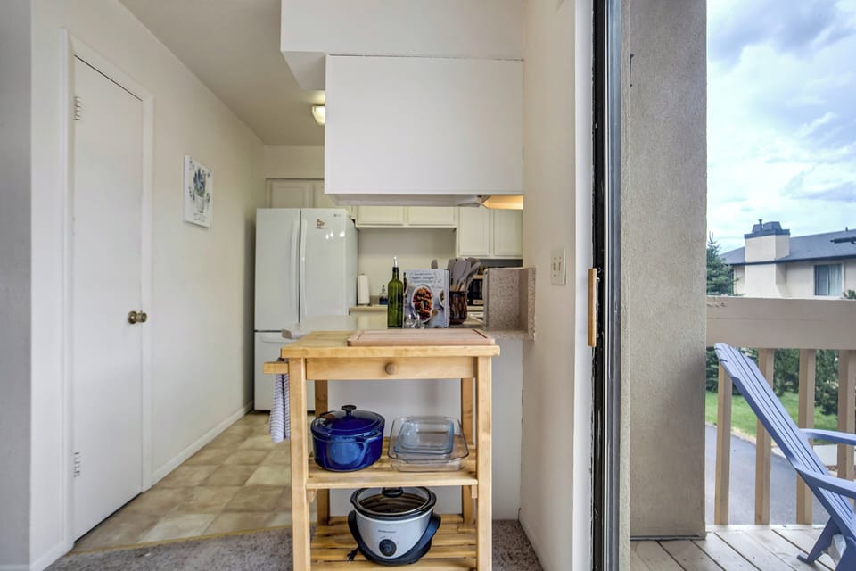 The fully equipped kitchen includes everything needed to prepare meals during your stay.