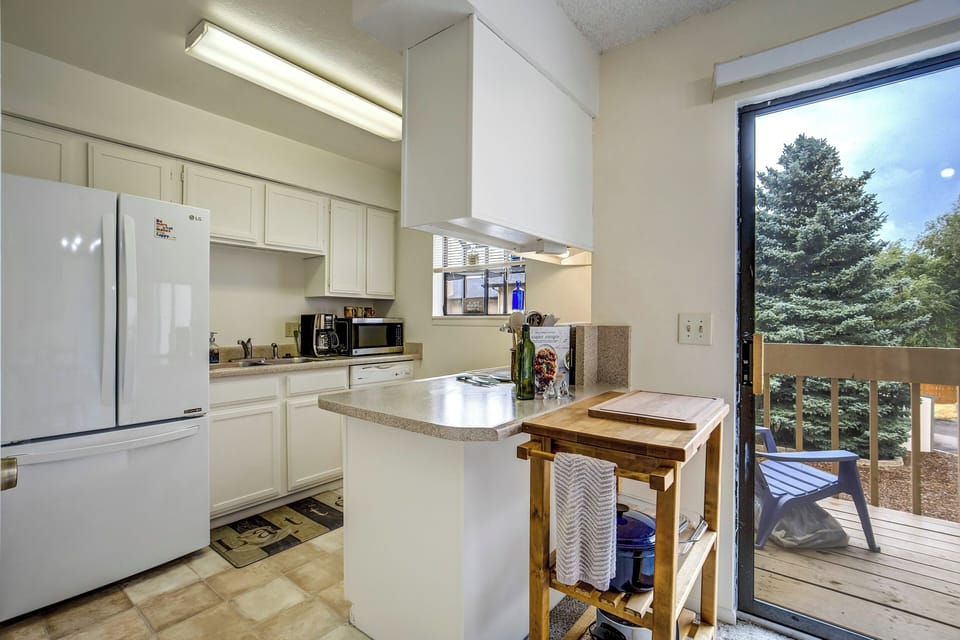 The fully equipped kitchen includes everything needed to prepare meals during your stay, including a drip coffee maker for your morning coffee.