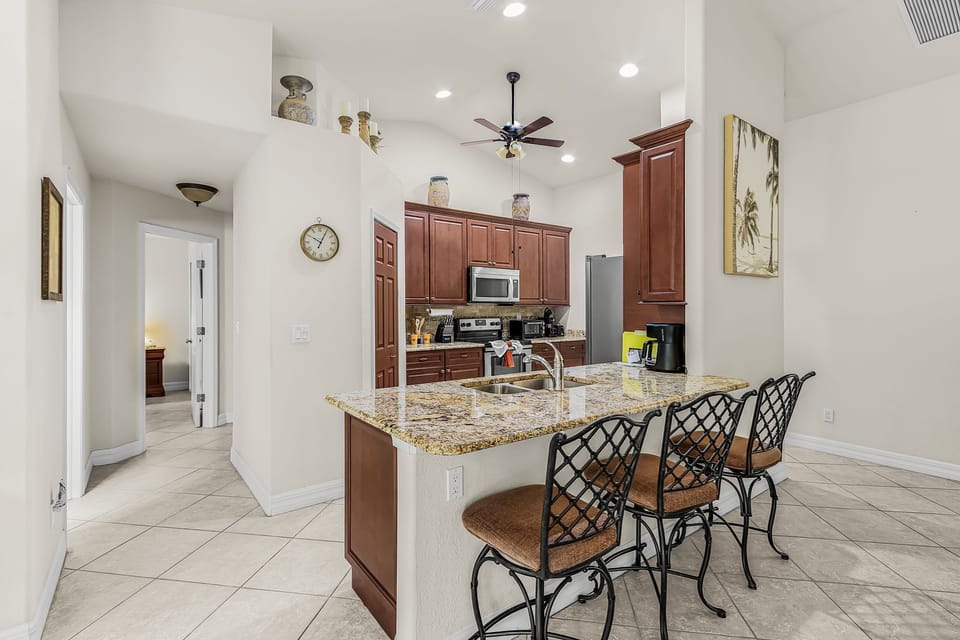 There is additional room at the breakfast bar in the fully-equipped kitchen