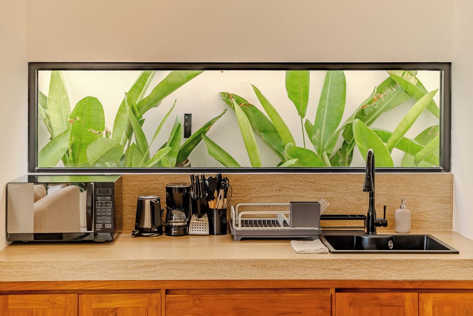 Villa | Private kitchen | Electric kettle, highchair, freezer