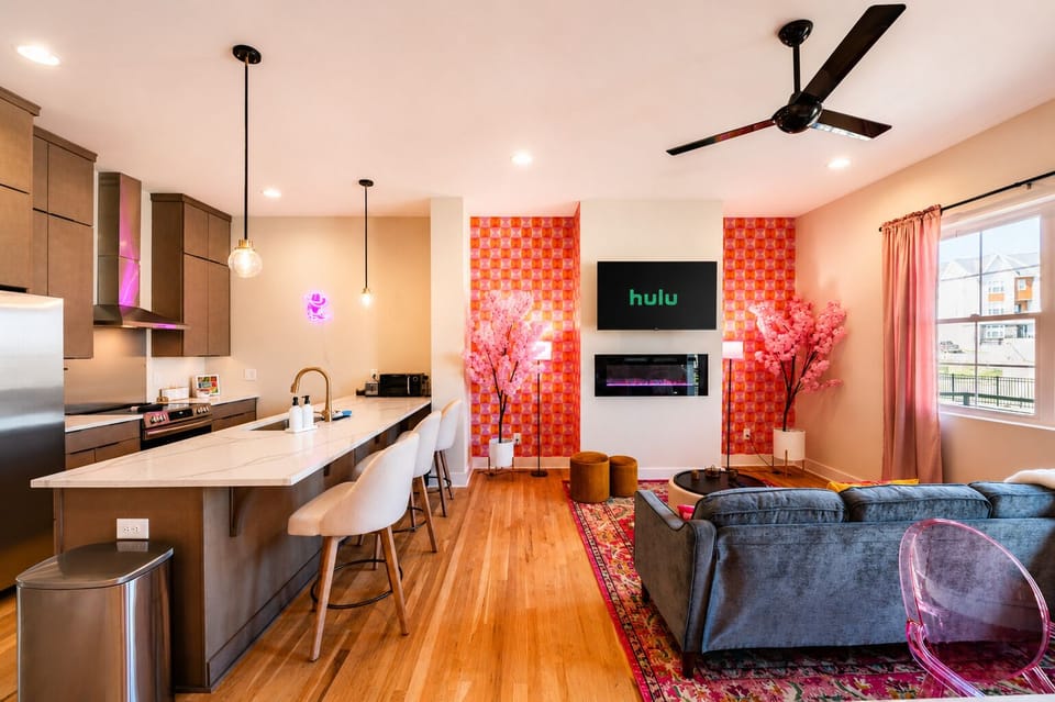 The open-concept layout connects the kitchen, dining, and living areas, making it easy for everyone to cook, chat, and spend time together.