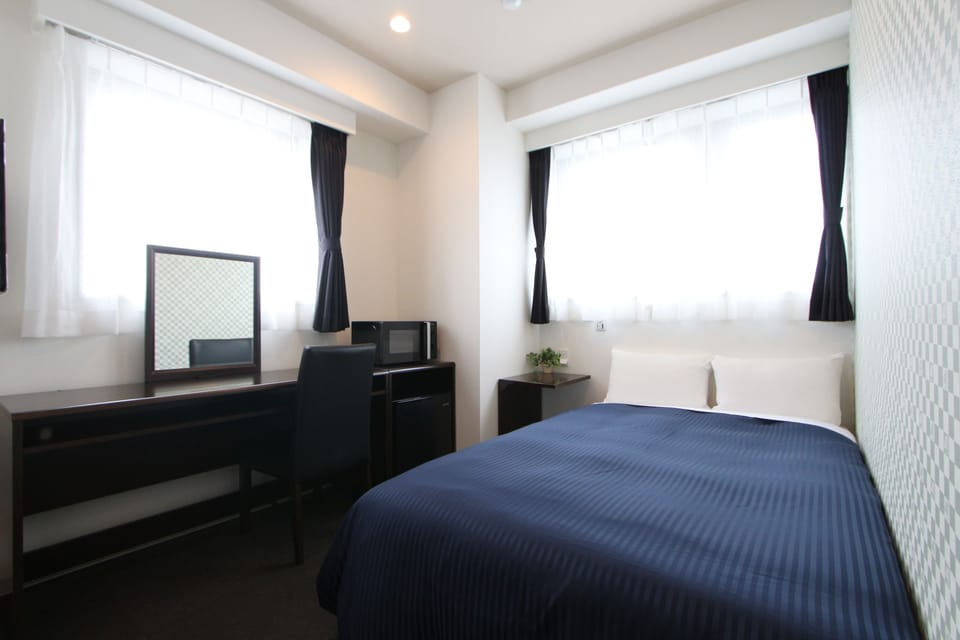 Desk, blackout drapes, soundproofing, free WiFi