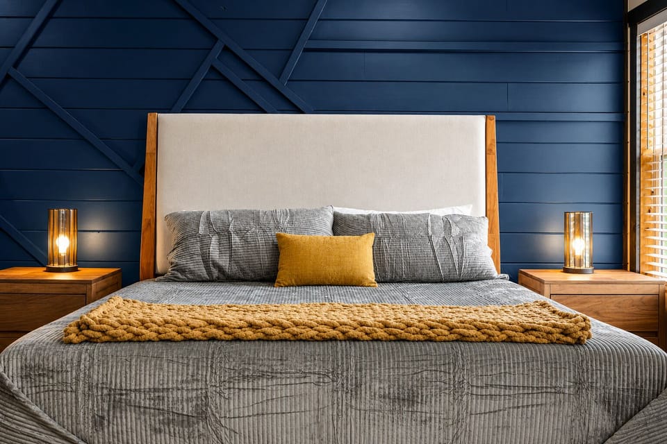 The king bed gives adults a comfortable retreat within the family bedroom, with additional bunk sleeping nearby.