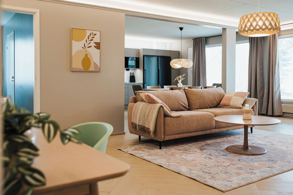 Apartment, 3 Bedrooms, Courtyard View | Living area | 65-inch Smart TV with cable channels