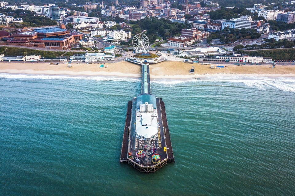 Steps to the pier and Ferris wheel with sweeping beachfront views