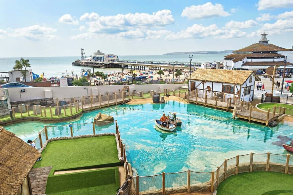 Sunny seafront views by the pier, steps to beach, boating & family fun