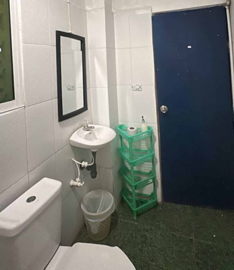 Economy Double Room | Bathroom | Shower, towels, soap, toilet paper