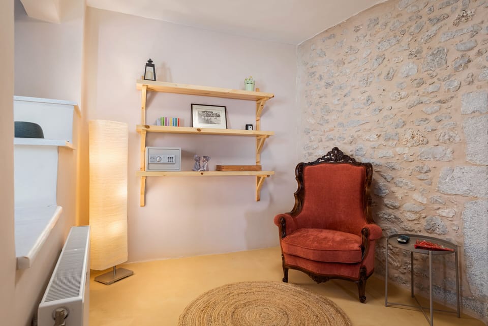 Villa, Sea View | Living area | 55-inch Smart TV with satellite channels
