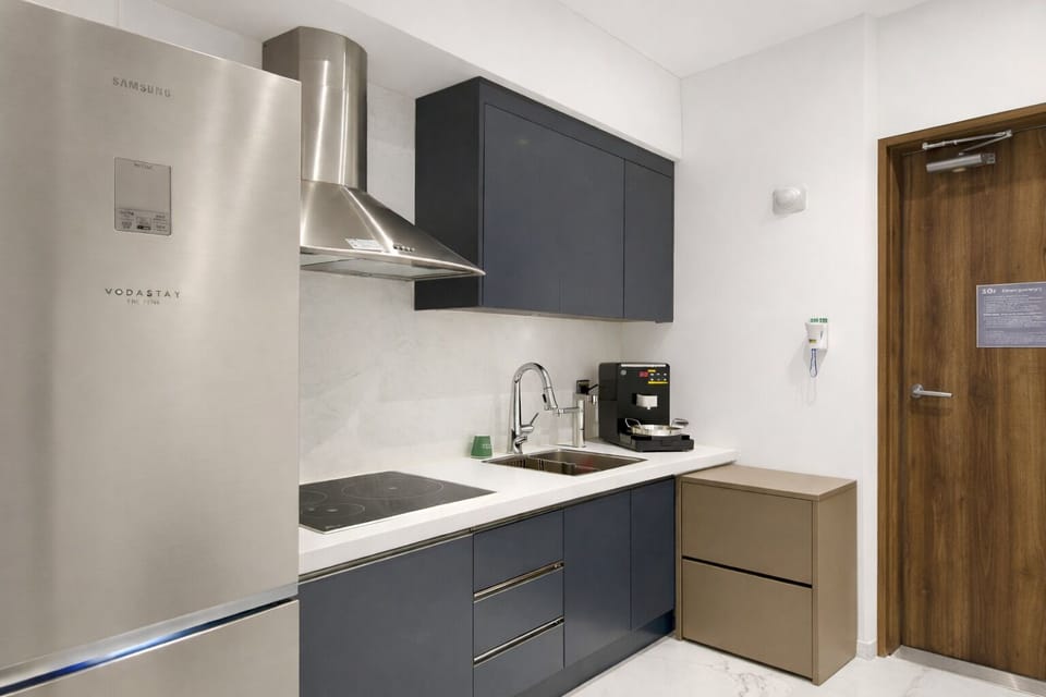 Fridge, microwave, stovetop, cookware/dishes/utensils