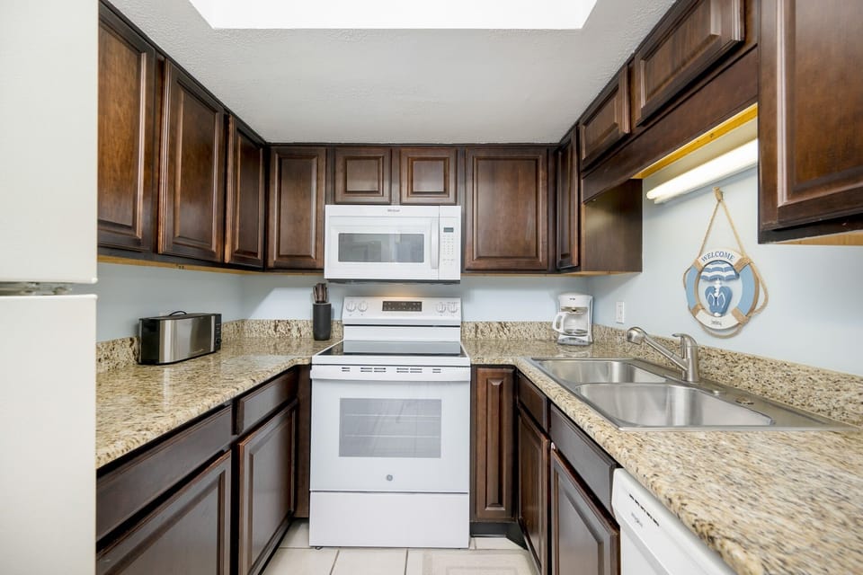 Condo, 2 Bedrooms | Private kitchen | Coffee/tea maker, fridge, oven